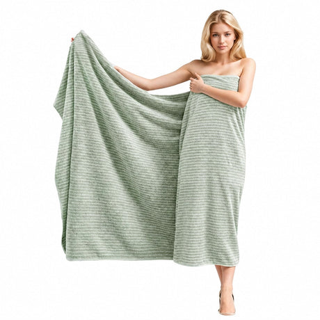 Badlakan / badhandduk – snabb torkning, helkroppstäckning – korallfleece, kantsydd finish - sparklar.se