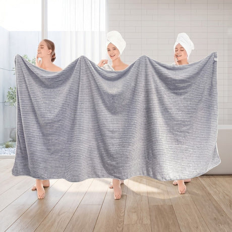 Badlakan / badhandduk – snabb torkning, helkroppstäckning – korallfleece, kantsydd finish - sparklar.se