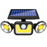 En solcellsvägglampa med tre lamphuvuden och solpanel